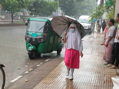 রাজধানীতে বৃষ্টি (ছবি: রাকিবুল ইসলাম)