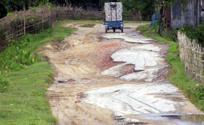 বড়-বড় গর্ত সৃষ্টি হওয়ায় এ সড়কে যাত্রী চলাচল কমে গেছে