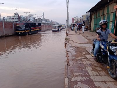 হালকা বৃষ্টি হলেও পানি জমে ডুবে যায় পুরো রাস্তা