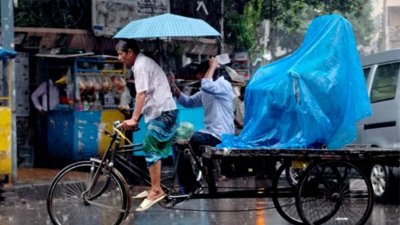 রাজধানীতে বৃষ্টি (ছবি: সাজ্জাদ হোসেন)