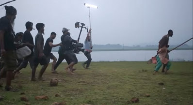 পাগলীকে টেনে হিঁচড়ে দূরে রেখে আসছে সাধু
