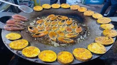 পদ্মা নদীর সৌন্দর্য উপভোগের পাশাপাশি মাওয়ায় ইলিশ খাওয়া (ছবি: সংগৃহীত)