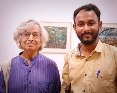যোগেন চৌধুরীর সঙ্গে লেখক 
