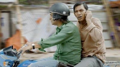 ‘আয়নাবাজি’র একটি দৃশ্যে পার্থ বড়ুয়া ও চঞ্চল চৌধুরী