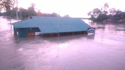 বন্যায় তলিয়ে যাওয়া এক স্কুল (ফাইল ছবি)