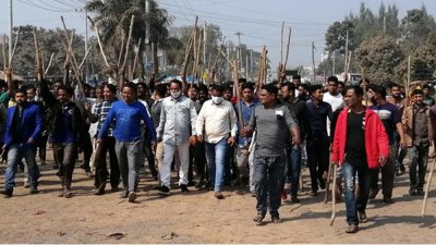 হামলার প্রতিবাদে লাঠি মিছিল