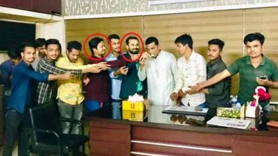 পলাতক আসামিদের সঙ্গে থানায় ওসির জন্মদিন উদযাপন