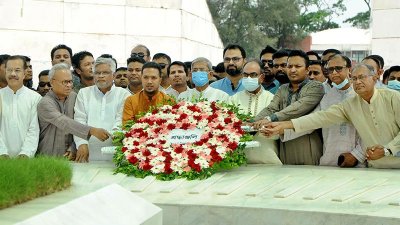 জিয়াউর  রহমানের মাজারে ফুল দিচ্ছেন মির্জা ফখরুল ইসলাম আলমগীরসহ বিএনপি নেতারা