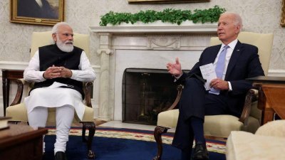 নরেন্দ্র মোদি ও জো বাইডেন। ফাইল ছবি: রয়টার্স