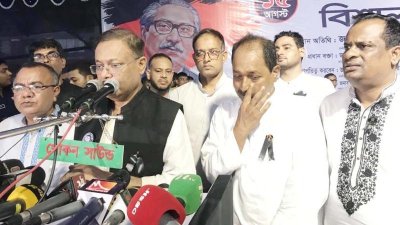 বাঘা উপজেলার আড়ানি মনোমোহিনী হাইস্কুল মাঠে আওয়ামী লীগের সভায় বক্তব্য দেন হাছান মাহমুদ