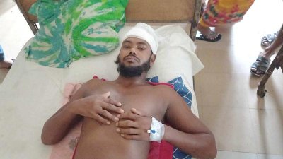সংঘর্ষে আহতদের একজন