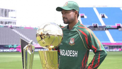 ট্রফির সামনে নাজমুল হোসেন শান্ত।