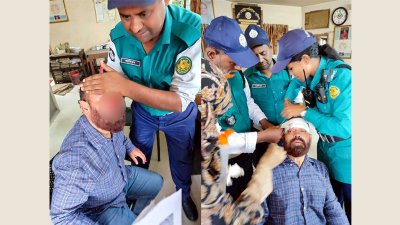 আহত কাজী সেলিম দ্বীনকে চিকিৎসা দিচ্ছেন ট্রাফিক পুলিশের সদস্যরা