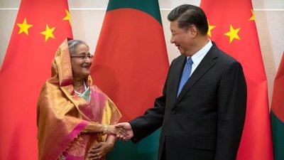 সাবেক প্রধানমন্ত্রী শেখ হাসিনা ও চীনা প্রেসিডেন্ট শি জিনপিং। ছবি: এপি