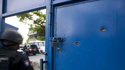 হাইতিতে কারাগারে থেকে পালানোর সময় ১২ আসামী নিহত। ছবি: এপি