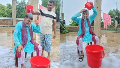আওয়ামী লীগ থেকে পদত্যাগের পর দুধ দিয়ে গোসল