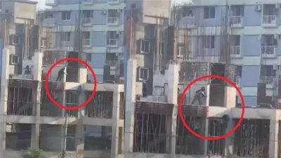 নির্মাণাধীন ভবনে ঝুলে থাকা আমির হোসেন ও পুলিশ (বৃত্তের মাঝে), ছবি সামাজিক যোগাযোগ মাধ্যম থেকে সংগৃহীত