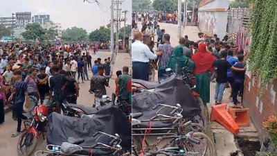আন্দোলনরত শ্রমিকদের বিক্ষোভ, গেট ধরে টানাটানি করেন কেউ কেউ (ছবি: বাংলা ট্রিবিউন)