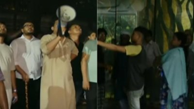 ভবনটি ঘিরে ফেলে স্থানীয়রা (ছবি: সংগৃহীত)