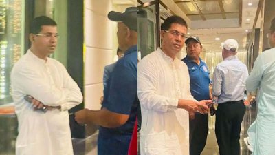 হোটেলে কথা বলছেন আবু নাইম সোহাগ (সাদা পাঞ্জাবি): ছবি সংগৃহীত