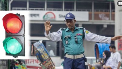 দায়ীত্ব পালন করছে ট্রাফিক পুলিশ। ছবি: সাজ্জাদ হোসেন
