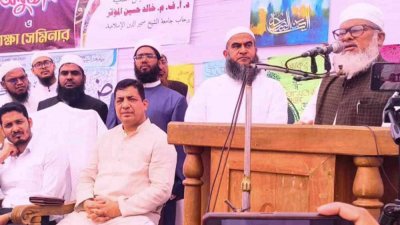 সেমিনারে বক্তব্য রাখছেন ধর্ম উপদেষ্টা ড. আ ফ ম খালিদ হোসেন