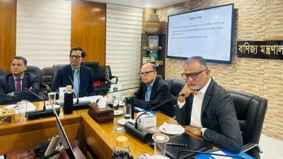 সভায় পাশাপাশি উপবিষ্ট বাণিজ্য উপদেষ্টা শেখ বশিরউদ্দীন ও খাদ্য উপদেষ্টা আলী ইমাম মজুমদার