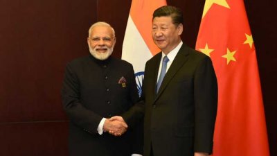 নরেন্দ্র মোদি ও শি জিনপিং। ফাইল ছবি: এক্স