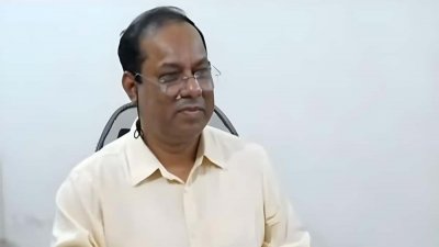 আসাদুজ্জামান  (ফাইল ফটো)