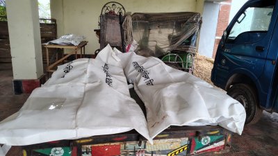 নিহত তিন জনের মরদেহ