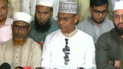 সংবাদ সম্মেলনে করে নির্বাচন বর্জনের ঘোষণা দেন  জামায়াতে ইসলামীর প্রার্থী মাসুদুর রহমান