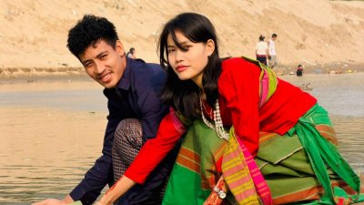 মিতুল মারমা ও তার স্ত্রী জেসমিন মারমা।