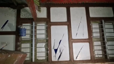 বাড়িঘরে হামলা ও ভাঙচুর