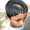 চুল কেটে দেওয়া শিক্ষার্থী