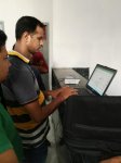 জঙ্গি মুরাদের আঙুলের ছাপ সংগ্রহ করছেন নির্বাচন কমিশনের এক কর্মকর্তা